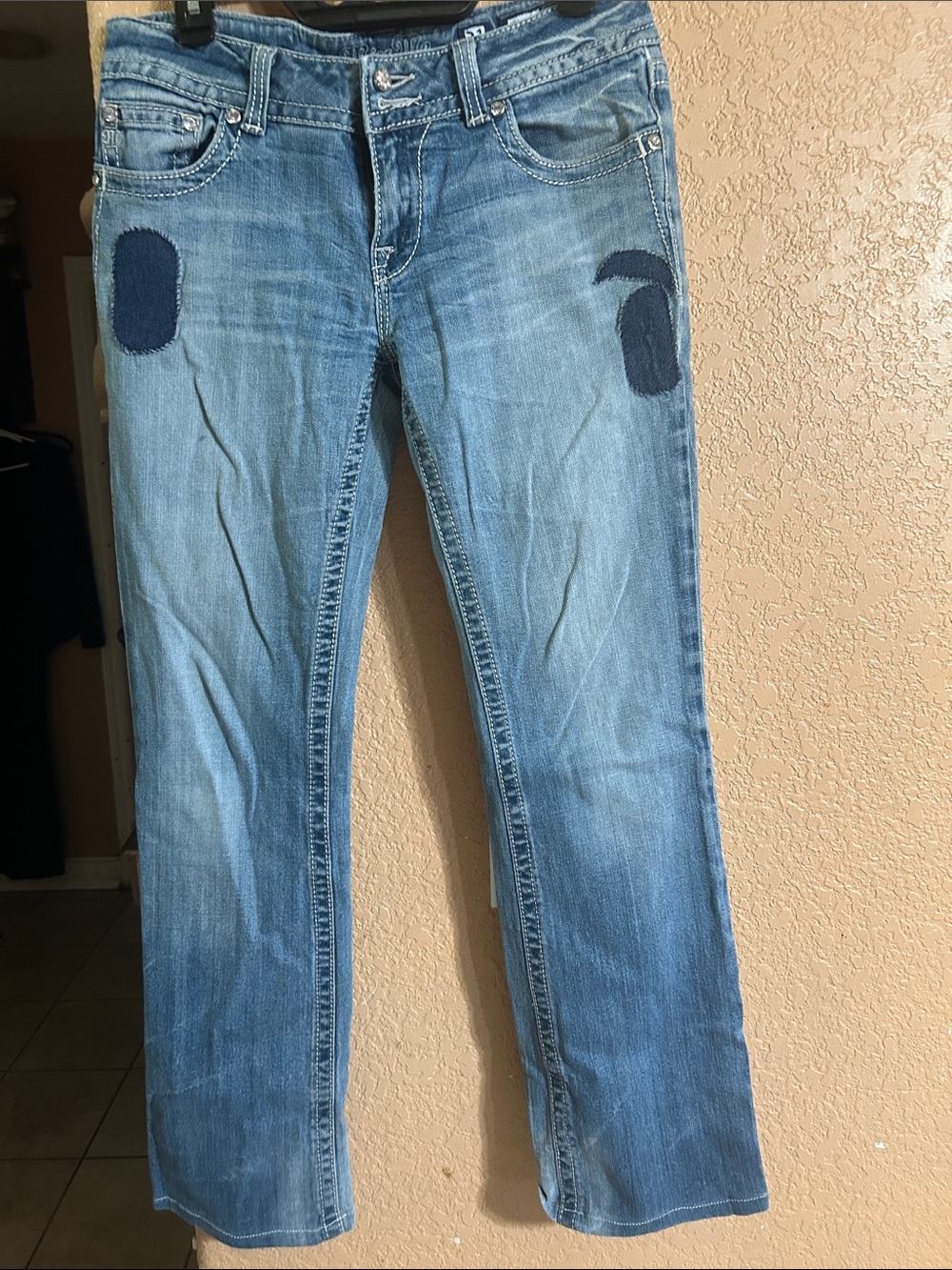 Miss Me Light Blue Boot Cut Jeans with Dark Blue Patch Accents